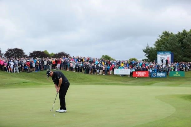 Shane Lowry of Ireland putts on the 18th hole during final round of The Dubai Duty Free Irish Open at Mount Juliet Golf Club on July 04, 2021 in...
