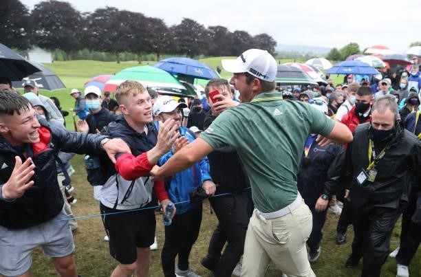 Lucas Herbert of Australia celebrates with fans after winning during final round of The Dubai Duty Free Irish Open at Mount Juliet Golf Club on July...