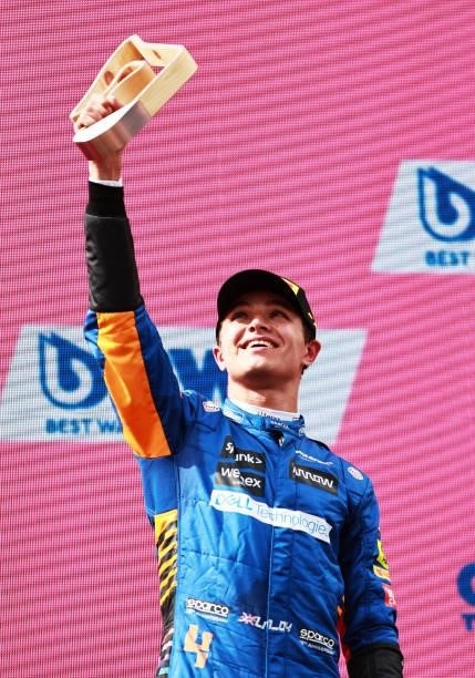 Third placed Lando Norris of Great Britain and McLaren F1 celebrates on the podium during the F1 Grand Prix of Austria at Red Bull Ring on July 04,...