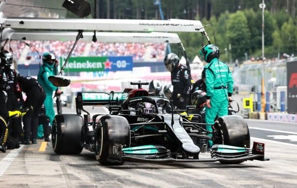 Lewis Hamilton of Great Britain driving the Mercedes AMG Petronas F1 Team Mercedes W12 makes a pitstop during the F1 Grand Prix of Austria at Red...