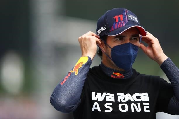 Sergio Perez of Mexico and Red Bull Racing walks to the grid before the F1 Grand Prix of Austria at Red Bull Ring on July 04, 2021 in Spielberg,...