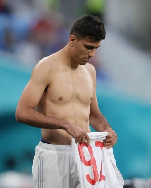 Rodri Hernandez of Spain switches his t-shirt during the UEFA Euro 2020 Championship Quarter-final match between Switzerland and Spain at Saint...