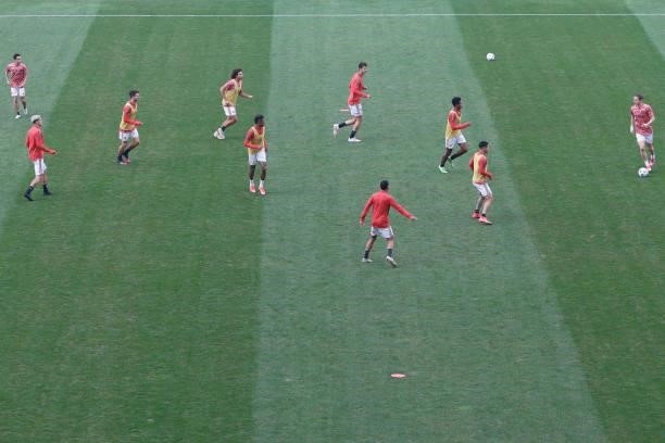 Flamengo team players warms-up before start a match between Flamengo and Fluminense as part of Brasileirao 2021 at Neo Quimica Arena on July 04, 2021...