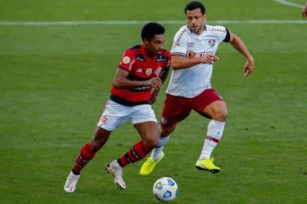Vitinho of Flamengo fight for the ball against Fred of Fluminense during a match between Flamengo and Fluminense as part of Brasileirao 2021 at Neo...
