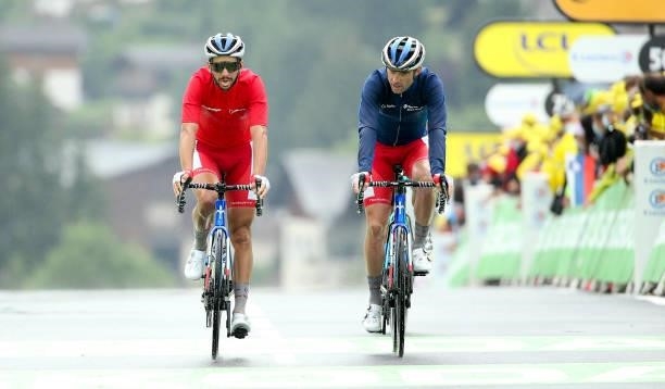 Anthony Turgis of France and TotalEnergies, Pierre Latour of France and TotalEnergies cross the finish line during stage 8 of the 108th Tour de...