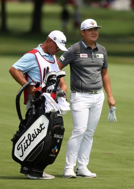 Sungjae Im of South Korea prepares to play his shot on the third hole during the final round of the Rocket Mortgage Classic on July 04, 2021 at the...