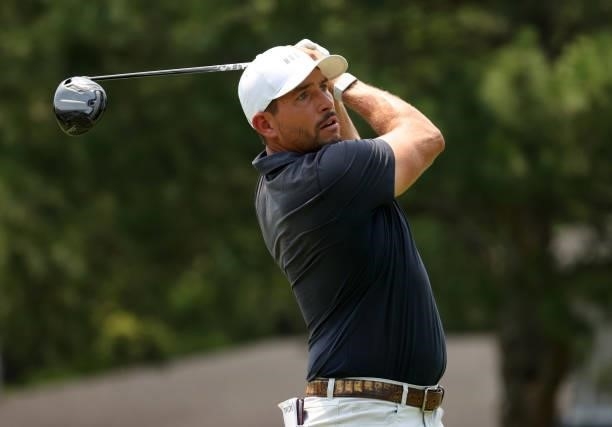 Scott Stallings plays his shot from the fourth tee during the final round of the Rocket Mortgage Classic on July 04, 2021 at the Detroit Golf Club in...