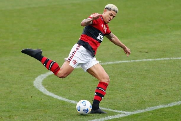 Pedro of Flamengo kicks the ball during a match between Flamengo and Fluminense as part of Brasileirao 2021 at Neo Quimica Arena on July 04, 2021 in...