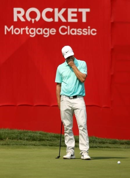 Alex Noren of Sweden reacts to his missed birdie putt on the 18th green during the final round of the Rocket Mortgage Classic on July 04, 2021 at the...
