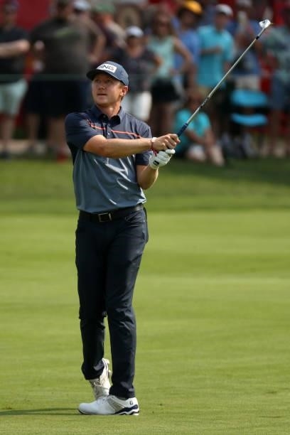 MacKenzie Hughes of Canada plays his shot on the 18th hole during the final round of the Rocket Mortgage Classic on July 04, 2021 at the Detroit Golf...