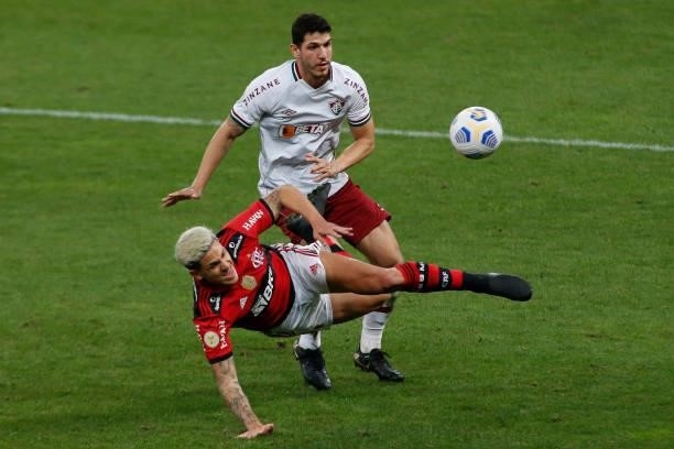 Pedro of Flamengo fights for the ball against Nino of Fluminense during a match between Flamengo and Fluminense as part of Brasileirao 2021 at Neo...