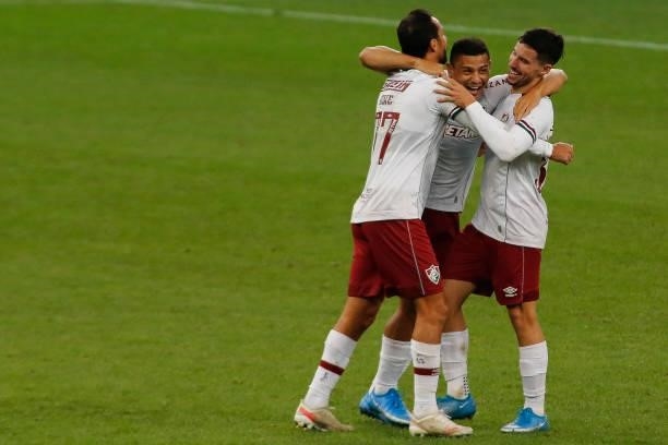 Andre of Fluminense celebrates with teammate Nene and Martinelli after a match between Flamengo and Fluminense as part of Brasileirao 2021 at Neo...