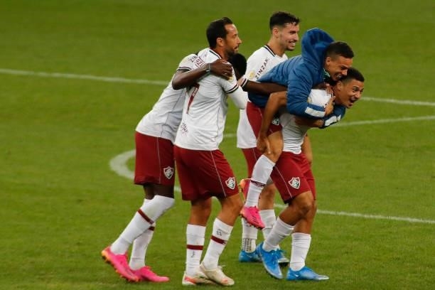 Andre of Fluminense celebrates with teammates after a match between Flamengo and Fluminense as part of Brasileirao 2021 at Neo Quimica Arena on July...
