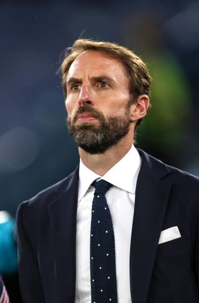 Gareth Southgate, Manager of England lines up for the national anthem prior to the UEFA Euro 2020 Championship Quarter-final match between Ukraine...