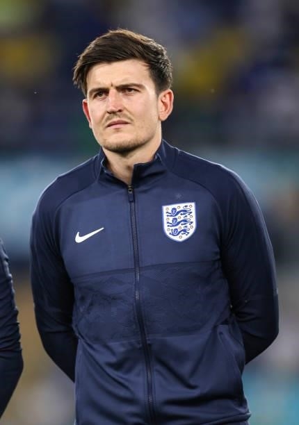 Harry Maguire of England lines up for the national anthem prior to the UEFA Euro 2020 Championship Quarter-final match between Ukraine and England at...