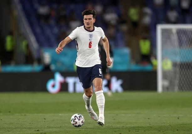 Harry Maguire of England runs with the ball during the UEFA Euro 2020 Championship Quarter-final match between Ukraine and England at Olimpico...