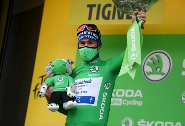 Mark Cavendish of Great Britain and Deceuninck - Quick Step retains the green jersey of best sprinter during the trophy ceremony of stage 9 of the...