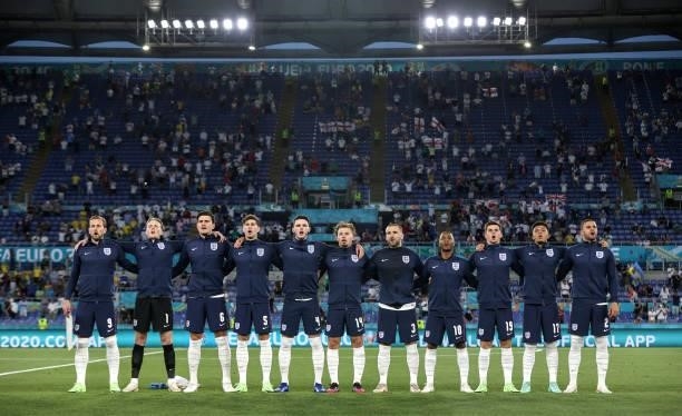 Players of England line up for the national anthem prior to the UEFA Euro 2020 Championship Quarter-final match between Ukraine and England at...