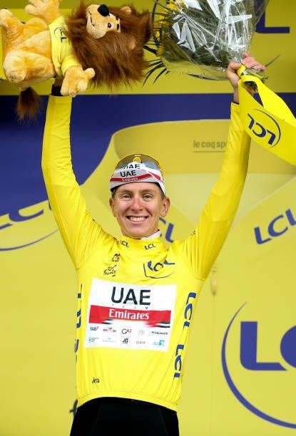 Tadej Pogacar of Slovenia and UAE Team Emirates retains the yellow jersey of race's leader during the trophy ceremony of stage 9 of the 108th Tour de...