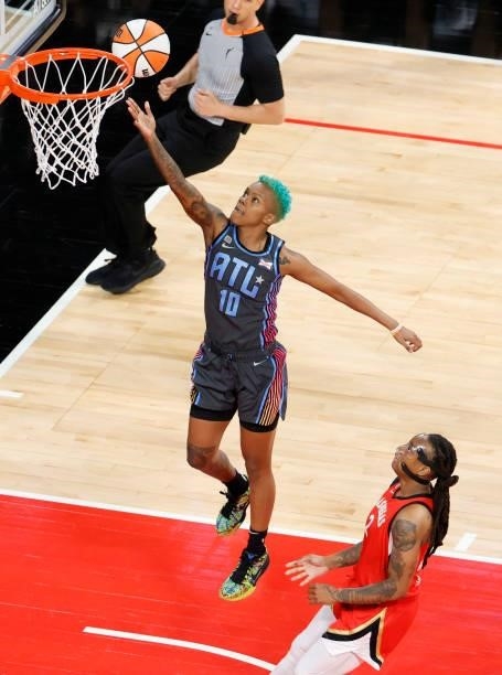 Courtney Williams of the Atlanta Dream shoots a layup against Riquna Williams of the Las Vegas Aces during their game at Michelob ULTRA Arena on July...