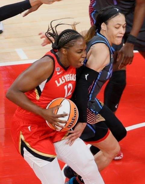 Chelsea Gray of the Las Vegas Aces is fouled by Chennedy Carter of the Atlanta Dream during their game at Michelob ULTRA Arena on July 4, 2021 in Las...