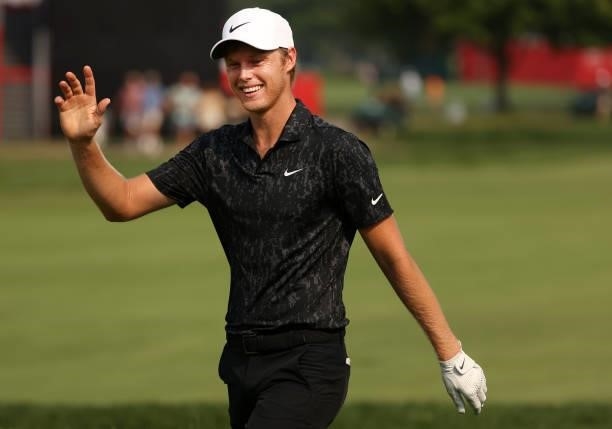 Cam Davis of Australia reacts after making an eagle on the 17th hole during the final round of the Rocket Mortgage Classic on July 04, 2021 at the...