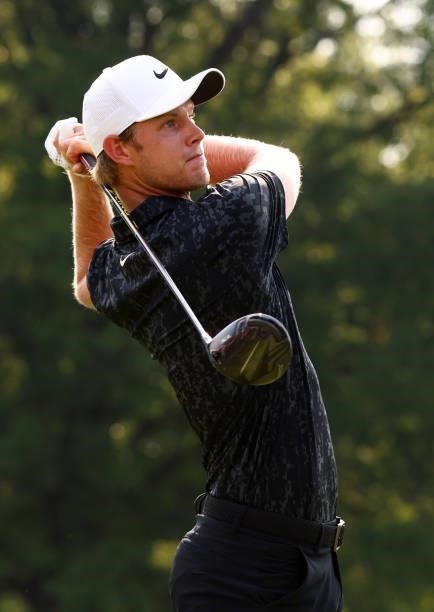 Cam Davis of Australia plays his shot from the 18th tee during the final round of the Rocket Mortgage Classic on July 04, 2021 at the Detroit Golf...