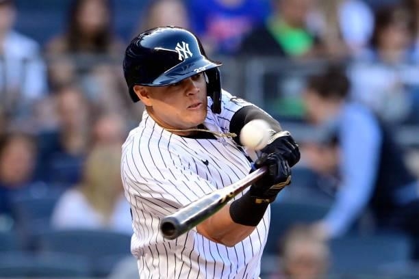 Gio Urshela of the New York Yankees hits a three-run home run against the New York Mets in the second inning during game two of a doubleheader at...