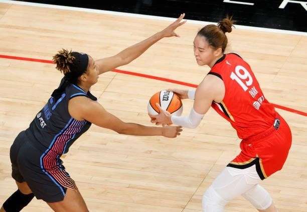 JiSu Park of the Las Vegas Aces is guarded by Tianna Hawkins of the Atlanta Dream during their game at Michelob ULTRA Arena on July 4, 2021 in Las...