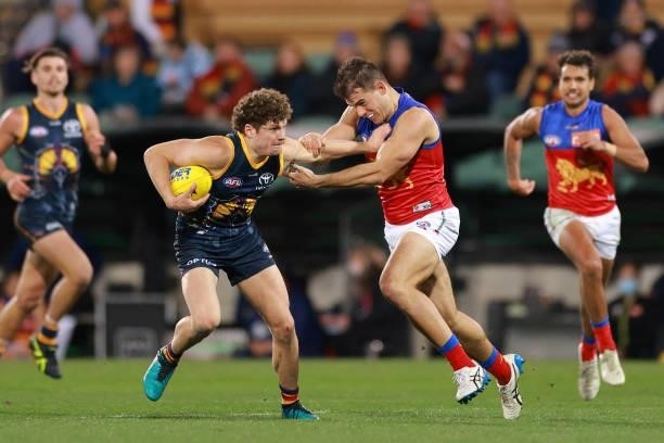 Harry Schoenberg of the Crows competes for the ball during the round 16 AFL match between Adelaide Crows and Brisbane Lions at Adelaide Oval on July...