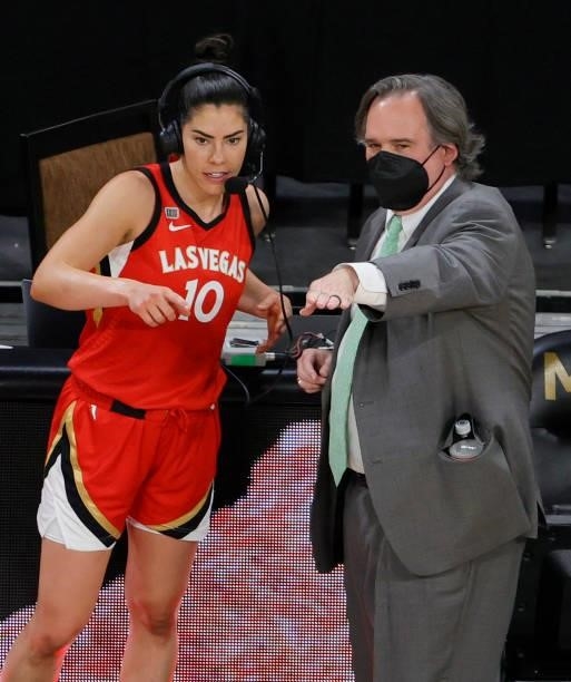 Kelsey Plum of the Las Vegas Aces talks with Aces director of media relations John "Giggy