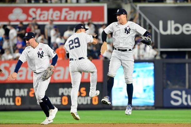Aaron Judge and Gio Urshela of the New York Yankees celebrate a 4-2 win against the New York Mets during game two of a doubleheader at Yankee Stadium...