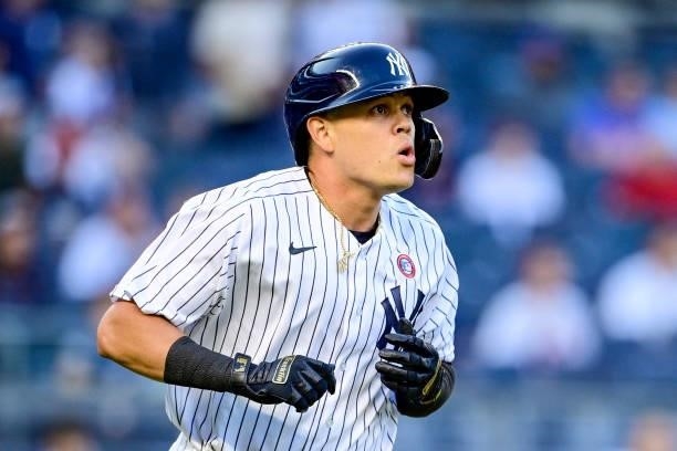 Gio Urshela of the New York Yankees watches his three-run home run leave the park against the New York Mets in the second inning during game two of a...