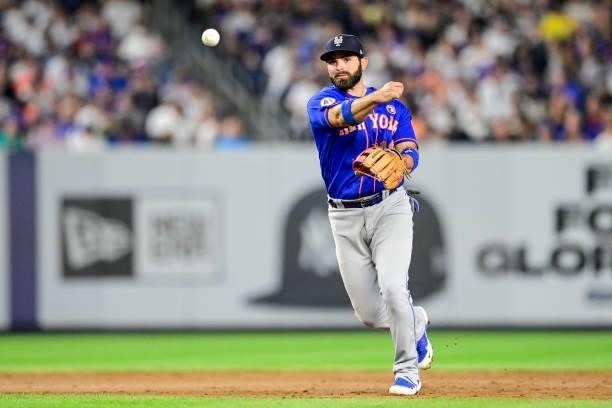 Jose Peraza of the New York Mets throws out Miguel Andujar of the New York Yankees in the fifth inning during game two of a doubleheader at Yankee...