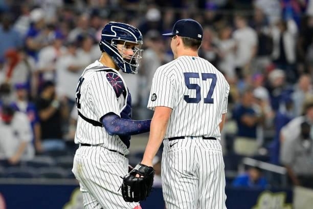 Gary Sanchez and Chad Green of the New York Yankees celebrate the team's 4-2 win against the New York Mets during game two of a doubleheader at...