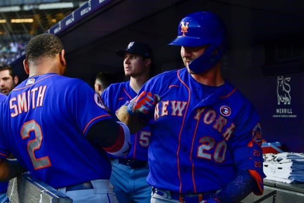 Pete Alonso of the New York Mets is congratulated by Dominic Smith after hitting a two run home run against the New York Yankees in the fourth inning...