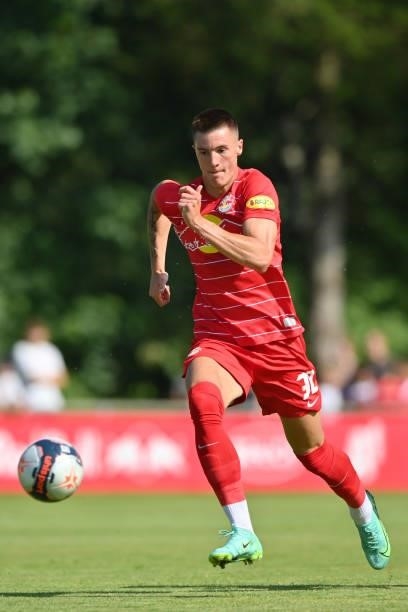 Benjamin Sesko of FC Red Bull Salzburg plays the ball during the Pre-Season Friendly match between FC Red Bull Salzburg and AS Monaco at Maximarkt...