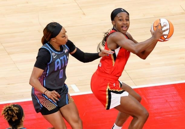 Jackie Young of the Las Vegas Aces drives to the basket against Odyssey Sims of the Atlanta Dream during their game at Michelob ULTRA Arena on July...