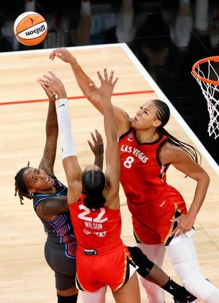Ja Wilson and Liz Cambage of the Las Vegas Aces both block a shot by Crystal Bradford of the Atlanta Dream during their game at Michelob ULTRA Arena...