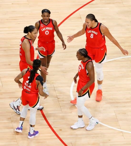 Riquna Williams, A'ja Wilson, Jackie Young, Liz Cambage and Chelsea Gray of the Las Vegas Aces celebrate on the court during their game against the...