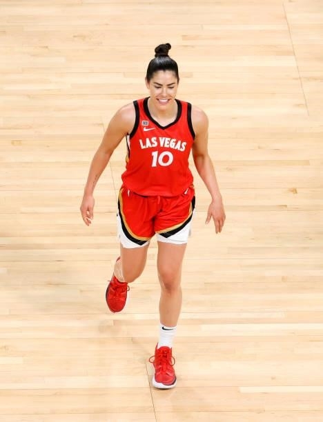 Kelsey Plum of the Las Vegas Aces walks across the court to greet friends after the team's 118-95 victory over the Atlanta Dream at Michelob ULTRA...