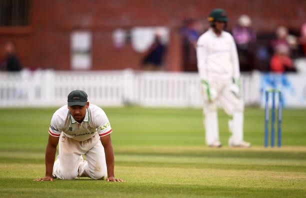 Ben Mike of Leicestershire cuts a dejected figure as the ball goes past them during Day Two of the LV= Insurance County Championship match between...