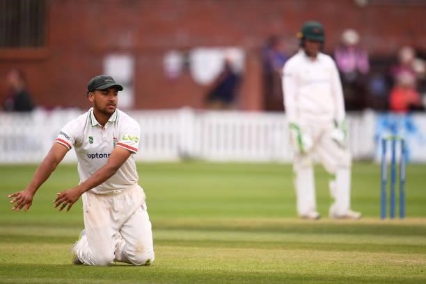 Ben Mike of Leicestershire cuts a dejected figure as the ball goes past them during Day Two of the LV= Insurance County Championship match between...