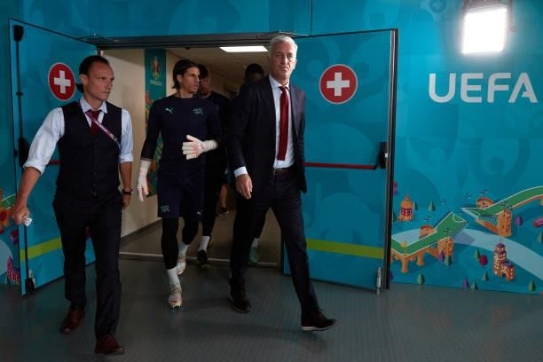 Manager Vladimir Petkovic of Switzerland walks with his goalkeepers Yann Sommer , Gregor Kobel and Yvon Mvogo at the dressing tunnel before the UEFA...