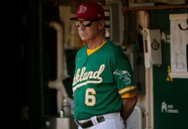 Manager Bob Melvin of the Oakland Athletics looks on from the dugout prior to the start of their game against the Boston Red Sox at RingCentral...