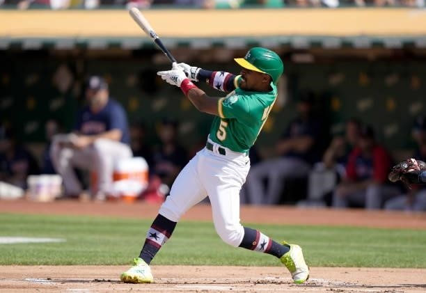 Tony Kemp of the Oakland Athletics bats against the Boston Red Sox in the bottom of the first inning at RingCentral Coliseum on July 03, 2021 in...