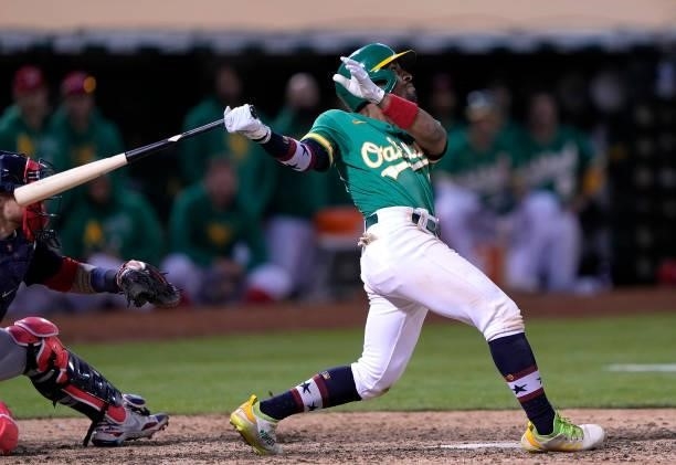 Tony Kemp of the Oakland Athletics hits a walk-off sacrifice fly scoring Seth Brown to defeat the Boston Red Sox 7-6 in the bottom of the 12th inning...