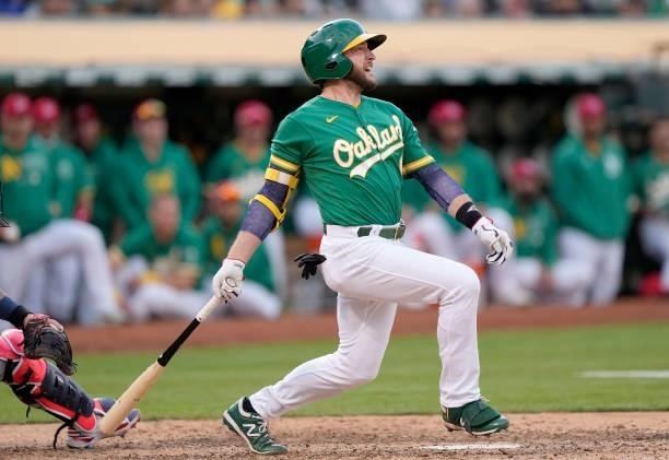 Jed Lowrie of the Oakland Athletics bats against the Boston Red Sox in the bottom of the 10th inning at RingCentral Coliseum on July 03, 2021 in...