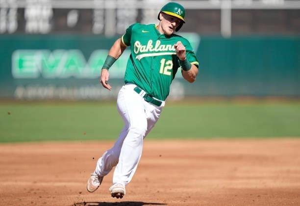 Sean Murphy of the Oakland Athletics rounds third base to score against the Boston Red Sox in the bottom of the second inning at RingCentral Coliseum...