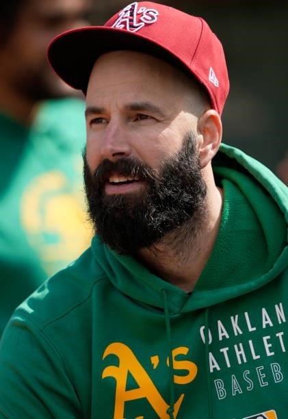 Mike Fiers of the Oakland Athletics looks on from the dugout prior to the start of his game against the Boston Red Sox at RingCentral Coliseum on...